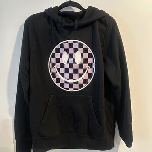 Black hoodie with light purple checkered Smiley face